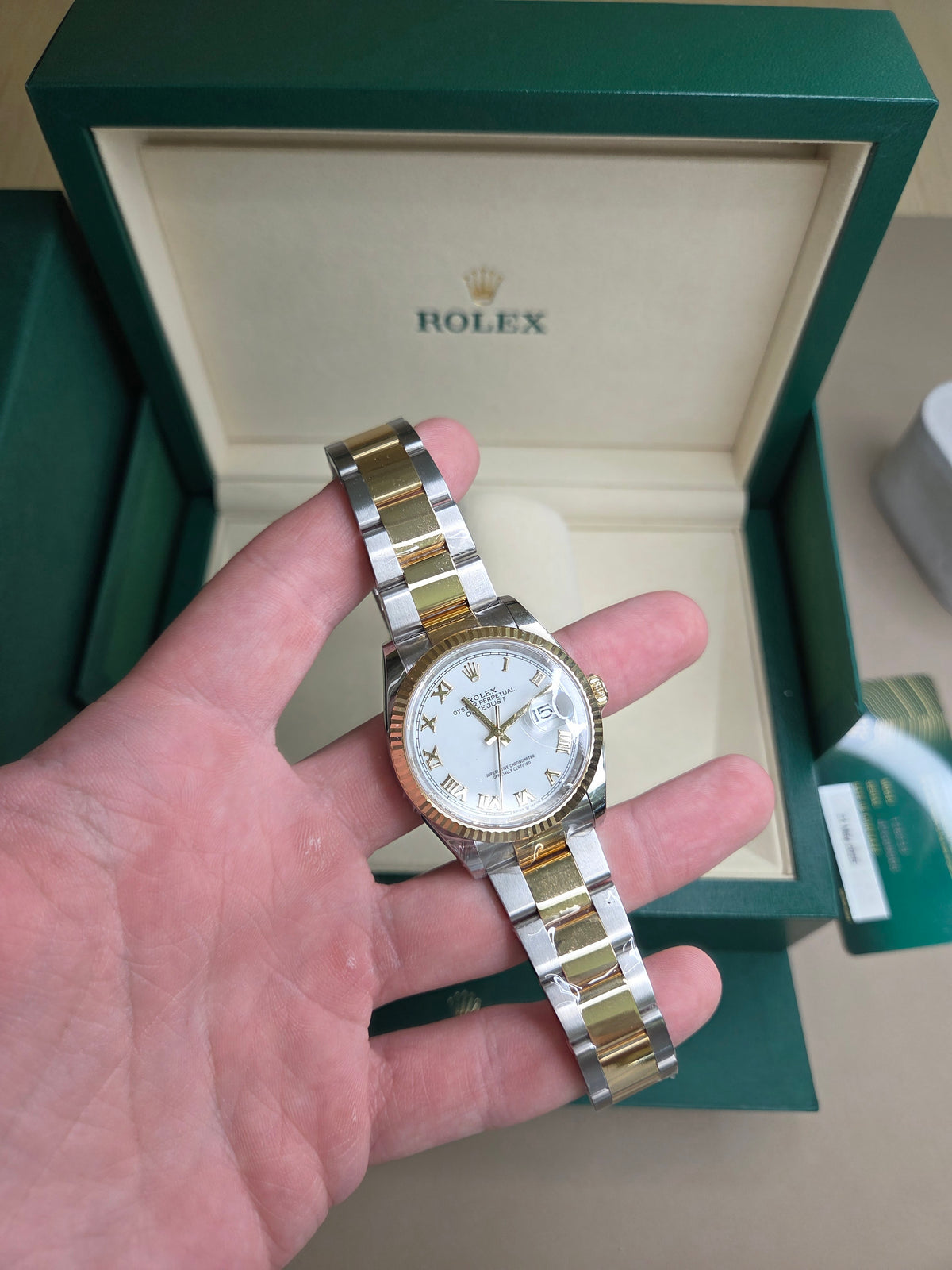 Rolex Datejust 36mm – Two‑Tone Yellow Gold & Stainless Steel – White Roman Dial – Fluted Bezel – Oyster Bracelet – 126233