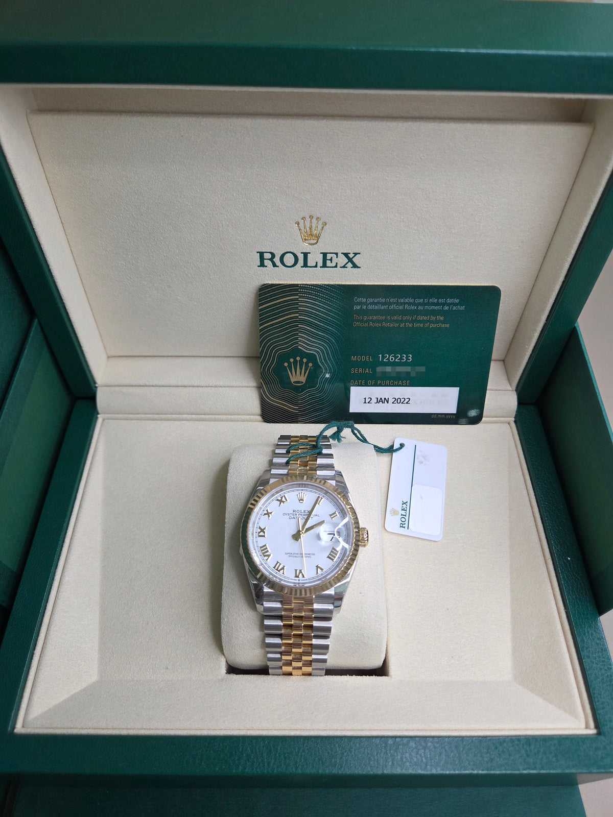 Rolex Datejust 36mm – Two‑Tone Yellow Gold & Stainless Steel – White Roman Dial – Fluted Bezel – Jubilee Bracelet – 126233